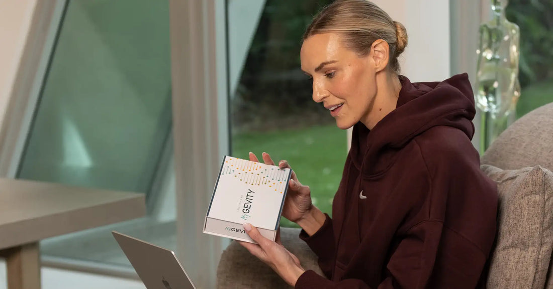Woman reviewing personalized genetic testing results to better understand estrogen metabolism, hormone balance, and overall wellness.
