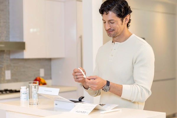 Man using MyGevity collection kit