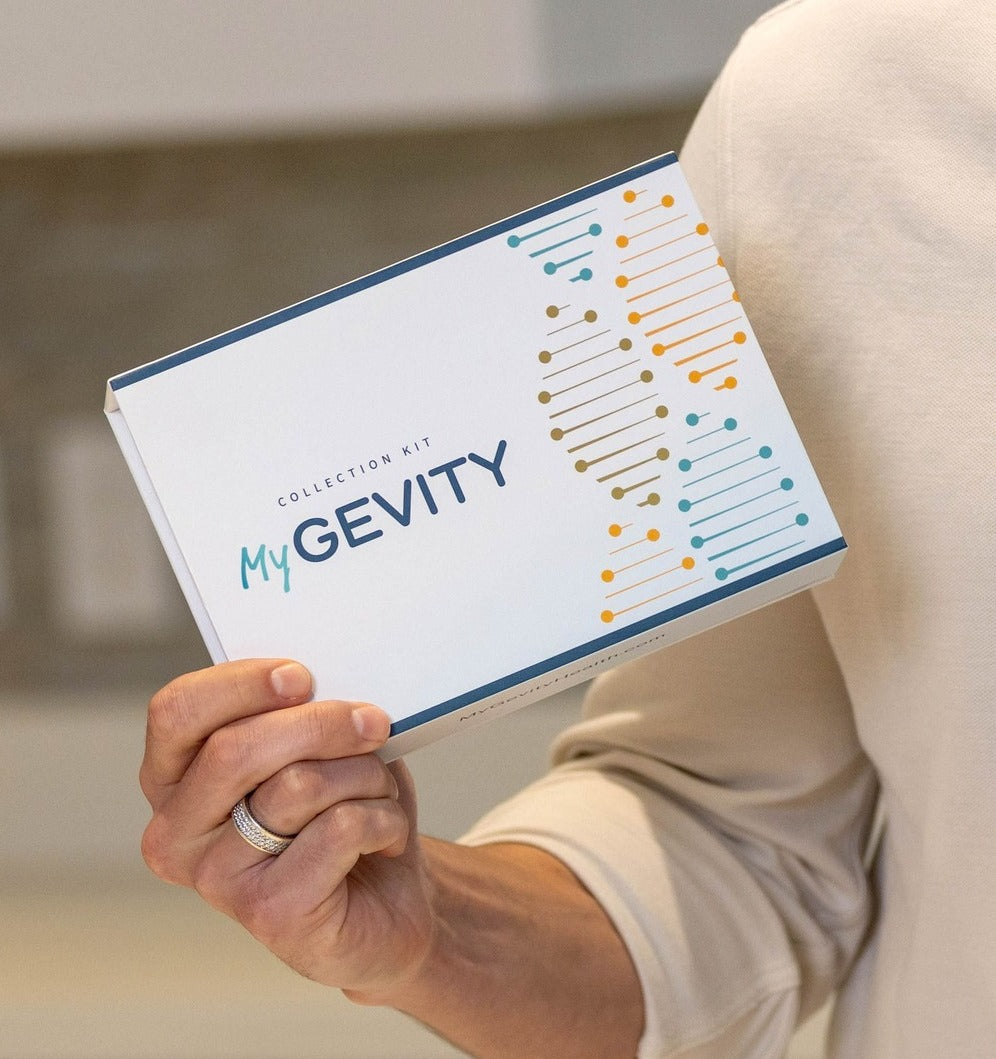 Person holding MyGevity test kit