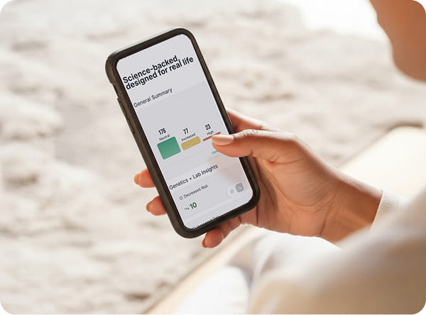Smartphone with MyGevity health statistics on screen