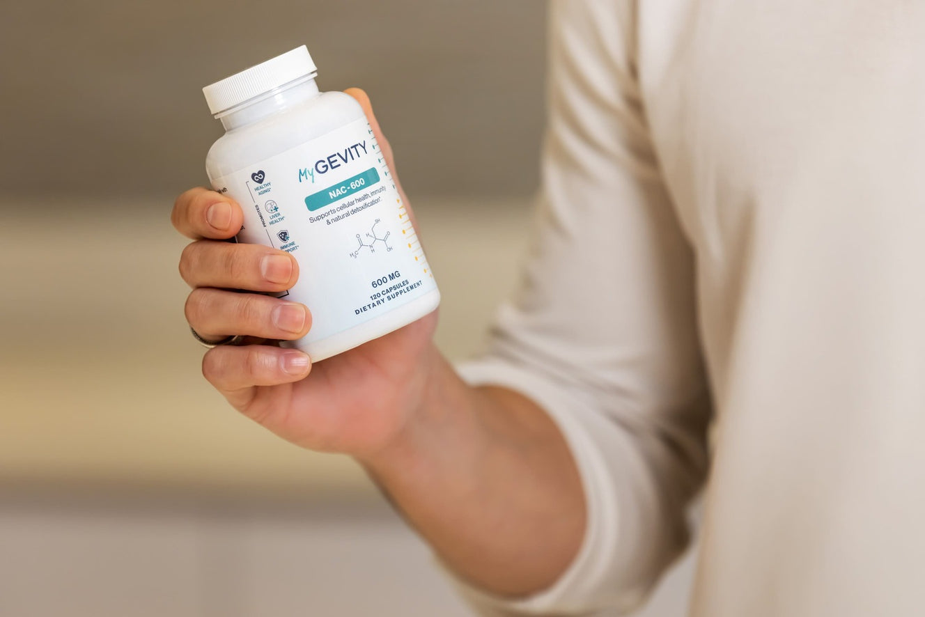 Man holding MyGevity NAC supplements
