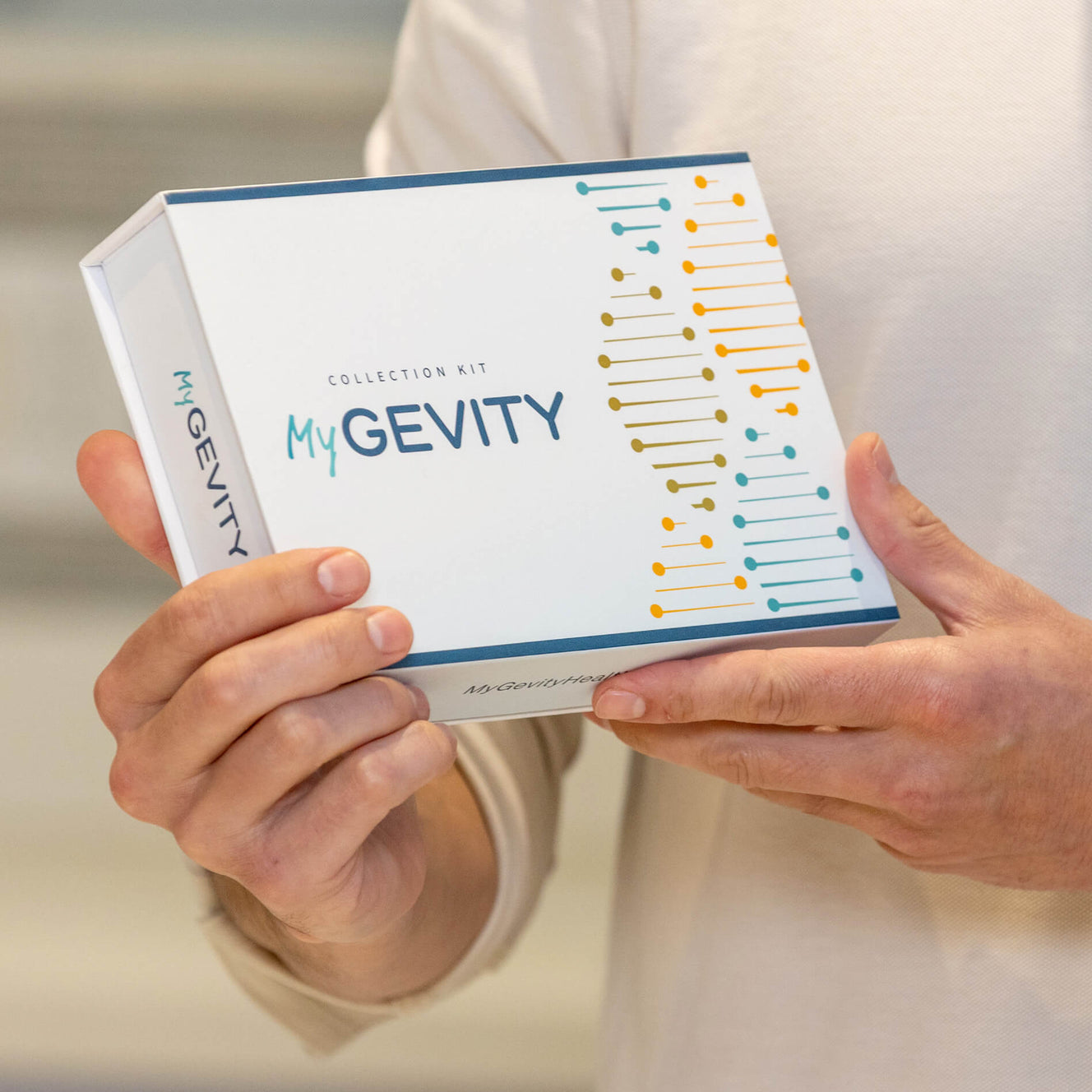 Man holding MyGevity test kit