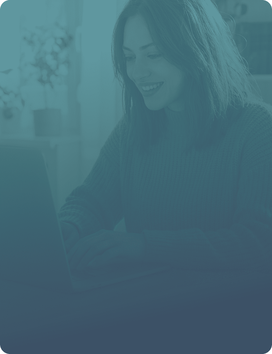 Woman sitting using a laptop